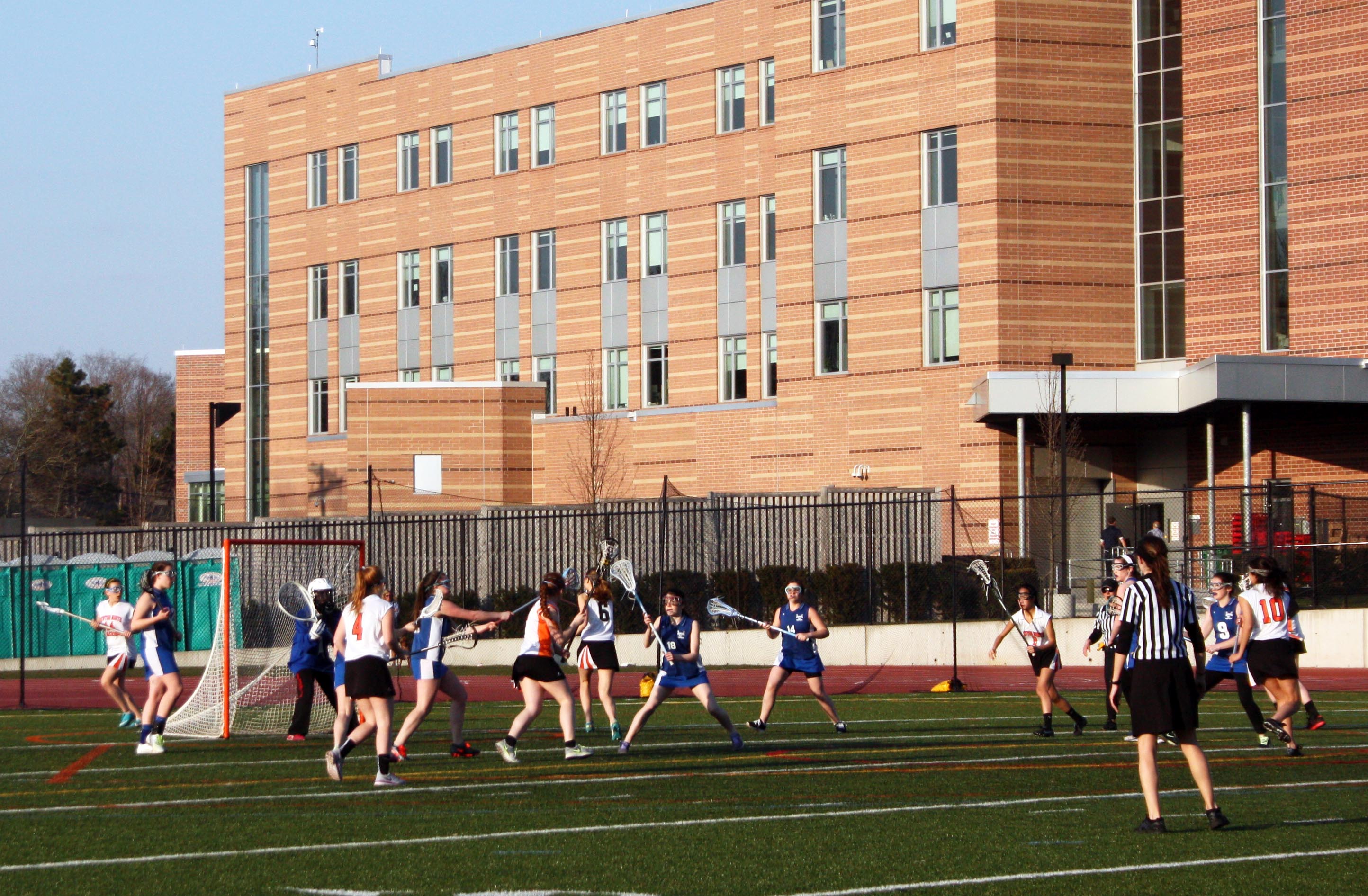 The Girls' Lacrosse team practices for a game.