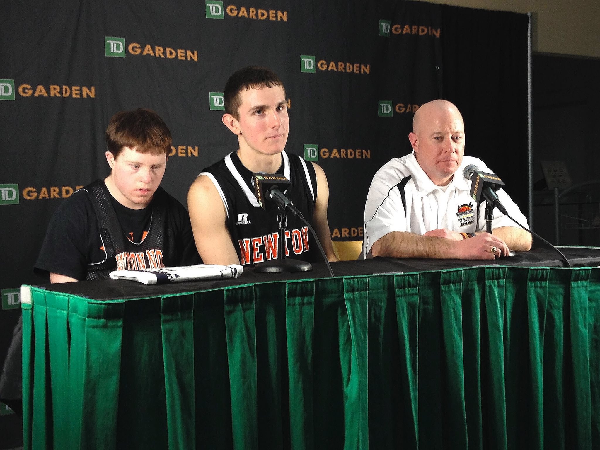 Team manager Brendan Durkin, junior captain Tommy Mobley, and basketball coach Paul Connolly fielding questions at last Saturday's Good Sports Invitational press conference. Photo by Jacob Gurvis.
