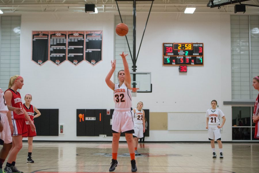 Senior captain Maddie Bledsoe shoots a free throw during the first half of yesterdays home playoff win against Bridgewater-Raynham. Photo by Judith Gibson-Okunieff.