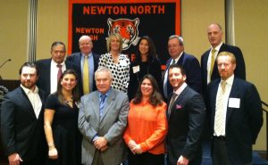 Inductees to the Newton North Hall of Fame pose for a photo. Photo by MacKenzie Silvia.