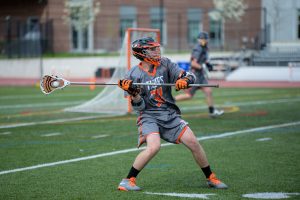 Boys' Lacrosse competes against Natick May 5.