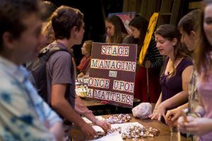 Theatre Ink: Junior Sam Shereda talks to senior Celia Gittleman about stage managing and Theatre Ink’s March musical, “Once Upon a Mattress,” at Theatre Ink’s open house Wednesday, Sept. 10. Graphic by Josh Shub-Seltzer.