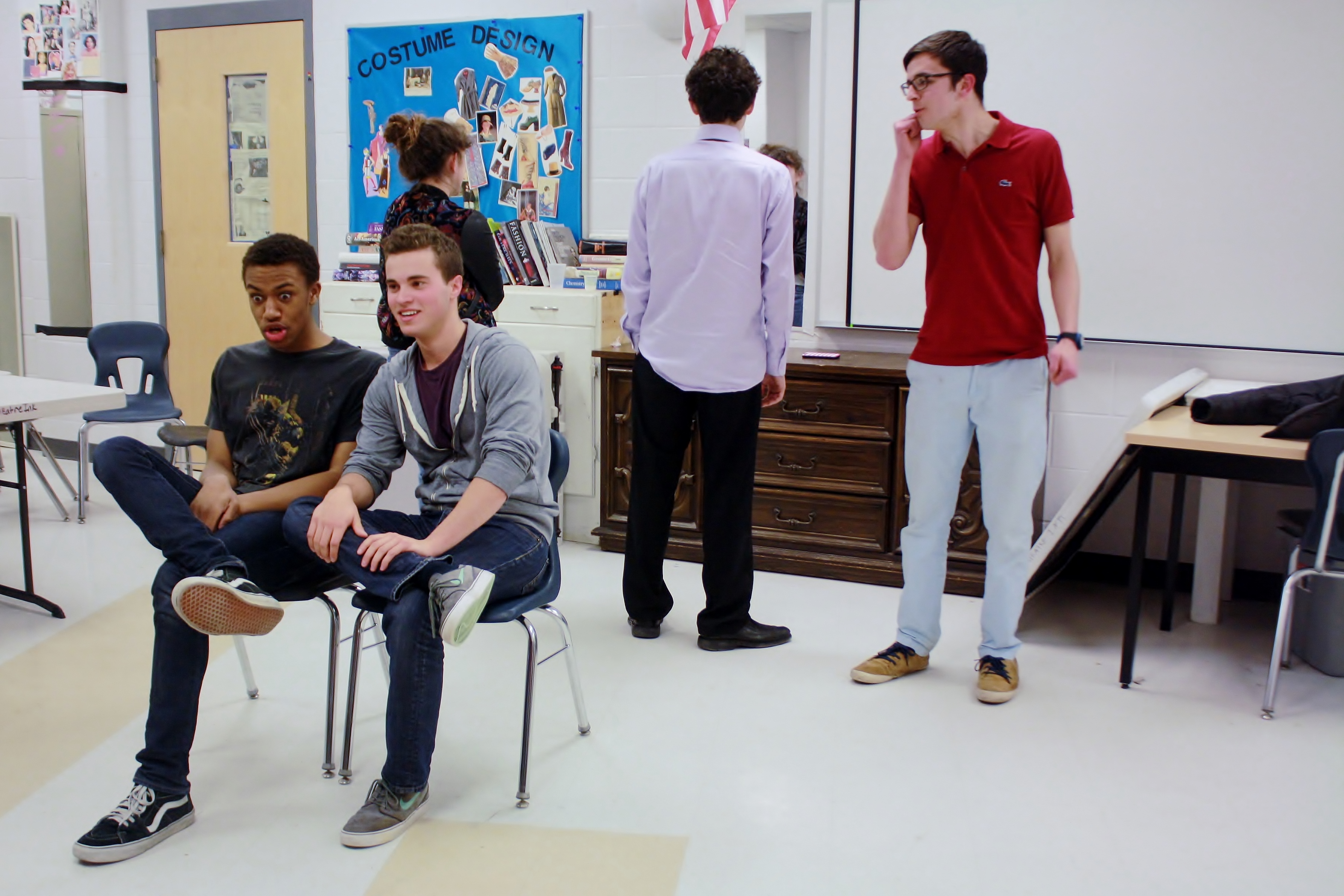 The cast of Spontaneous Generation rehearses one of its improvisational games. Photo by Devin Perlo.