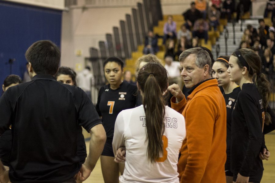 Coach Richard meets with the Varsity Girls Volleyball team during their semi-final loss last Tuesday, Nov. 17.