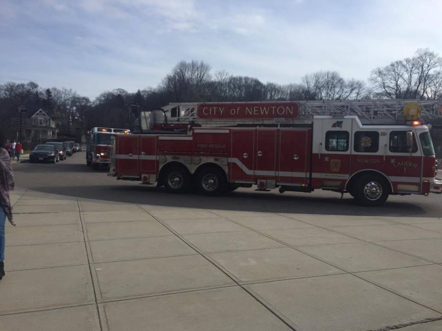 Fire trucks arrived at Tiger Drive as students evacuated the building. Photo by Jackie Gong