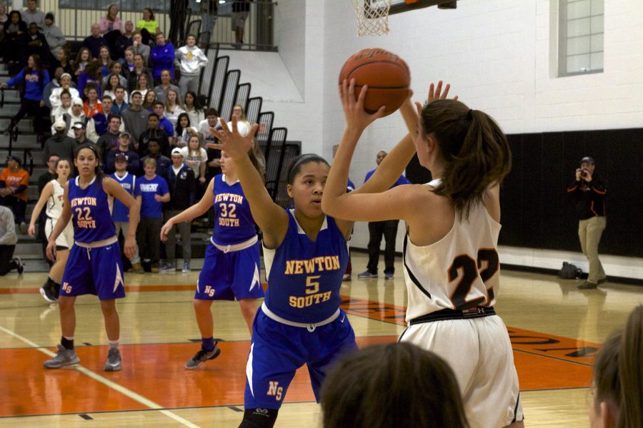 Tiger basketball season ends with girls' team playoff loss