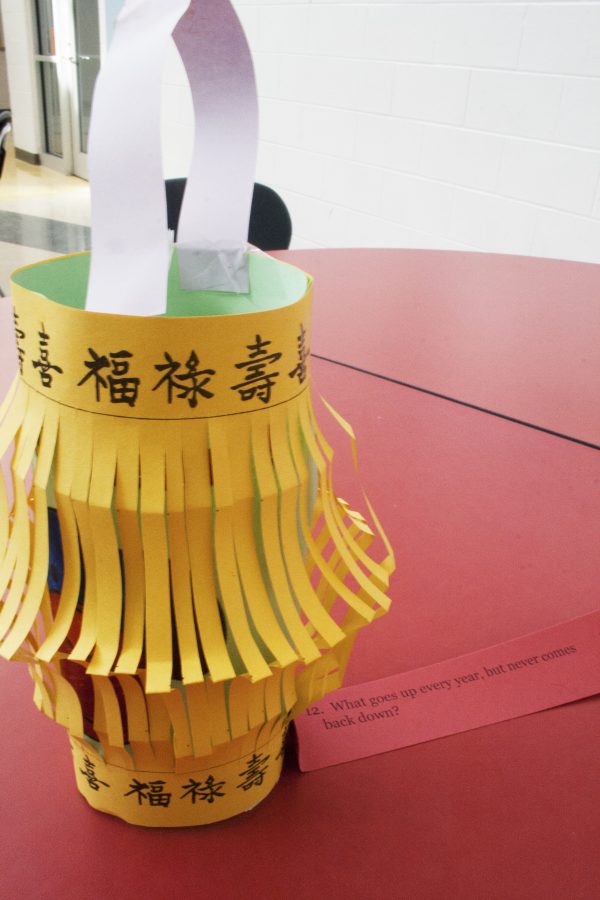 Newton North's Chinese classes display paper lanterns with riddles attached to them on Main Street and in the Cafeteria to celebrate Chinese New Year.