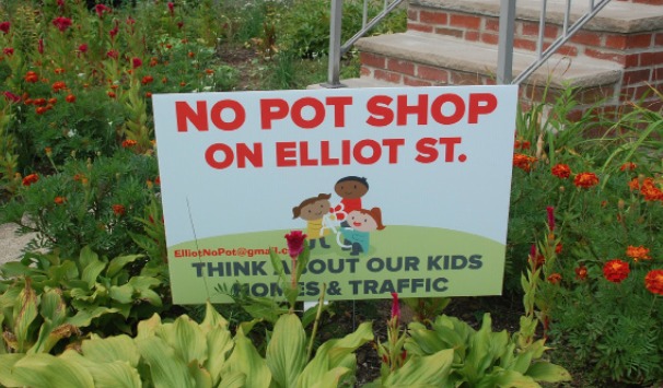 Residents of Elliot Street post no pot shop signs on their front lawns. (Photo by Samantha Fredberg)