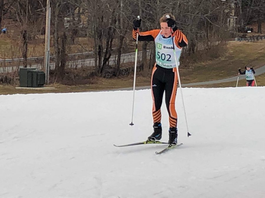 Sophomore Evan Hoch nears the finish line in an open meet at Weston Ski Track.
