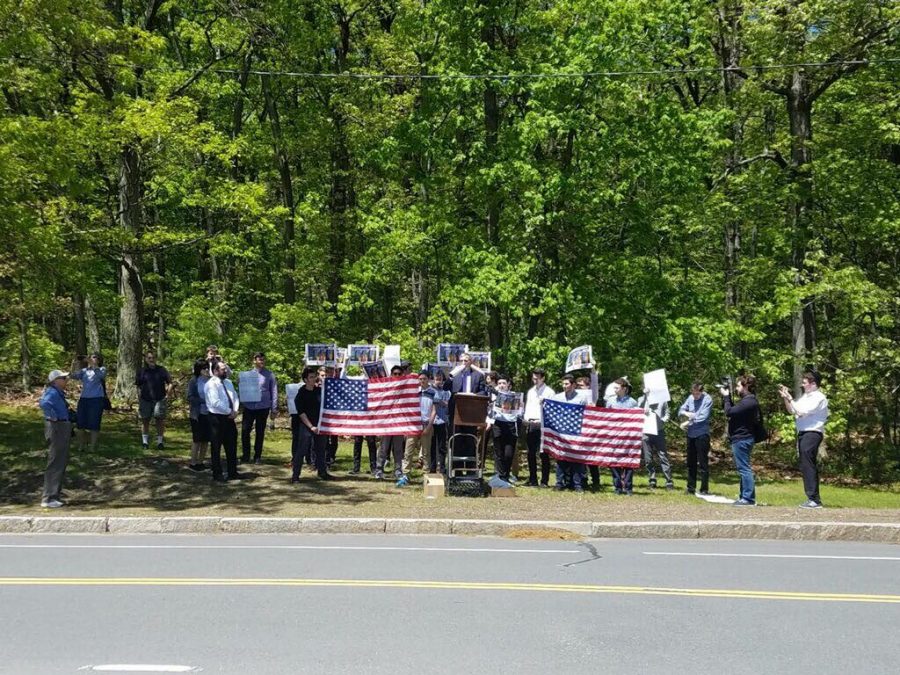 Students and staff from the Rambam Mesivta school in Lawrence, NY protest at South Tuesday, May 21. (Photo by Amy Huang)