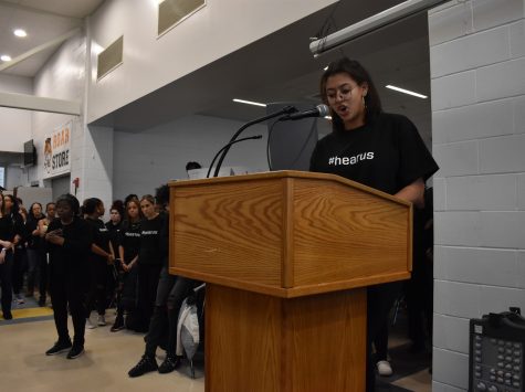 Senior Lela Davis speaks on the lack of action by the administration during the Blackout rally a-block Friday, Feb. 14 in the cafeteria