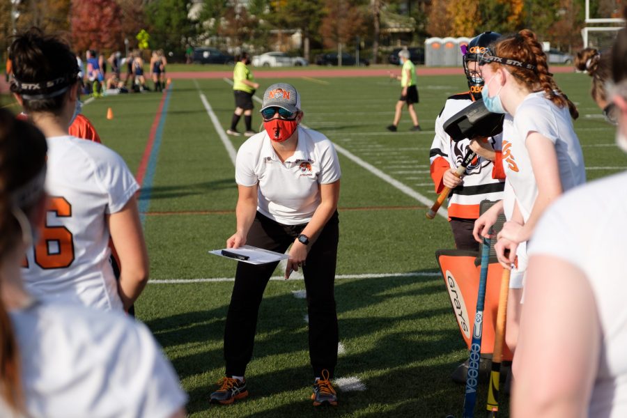 Head coach Cristy Moore gives a pep talk before the game Saturday, Nov. 7. (photo by Ian Dickerman)
