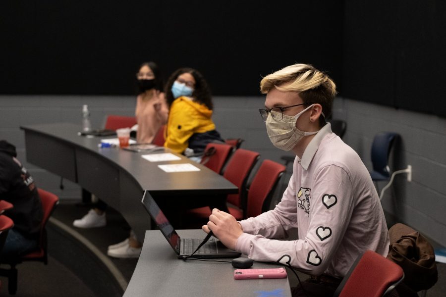 Senior Jacob Viveiros sits in on a reverse field trip in the film lecture hall for history teacher David Bedars Middle East, Asia, Latin America (MEALA) course Monday, Nov. 23. (photo by Ian Dickerman)