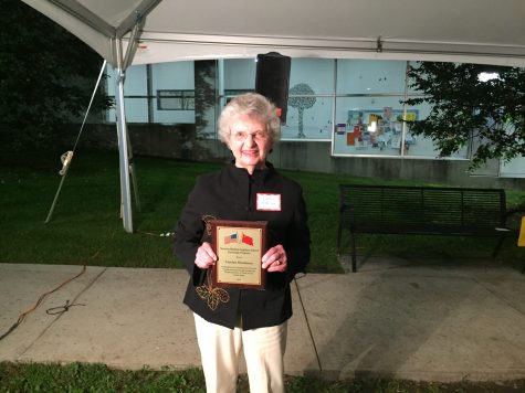 Carolyn Henderson with the Friend of the Exchange Award on October 14. (Photo by Emma Brignall).