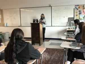 Sophomore Anika Walker presents her speech in English teacher Emily Lews c-block class Jan. 11, 2022. (Photo by Andy Zhou)