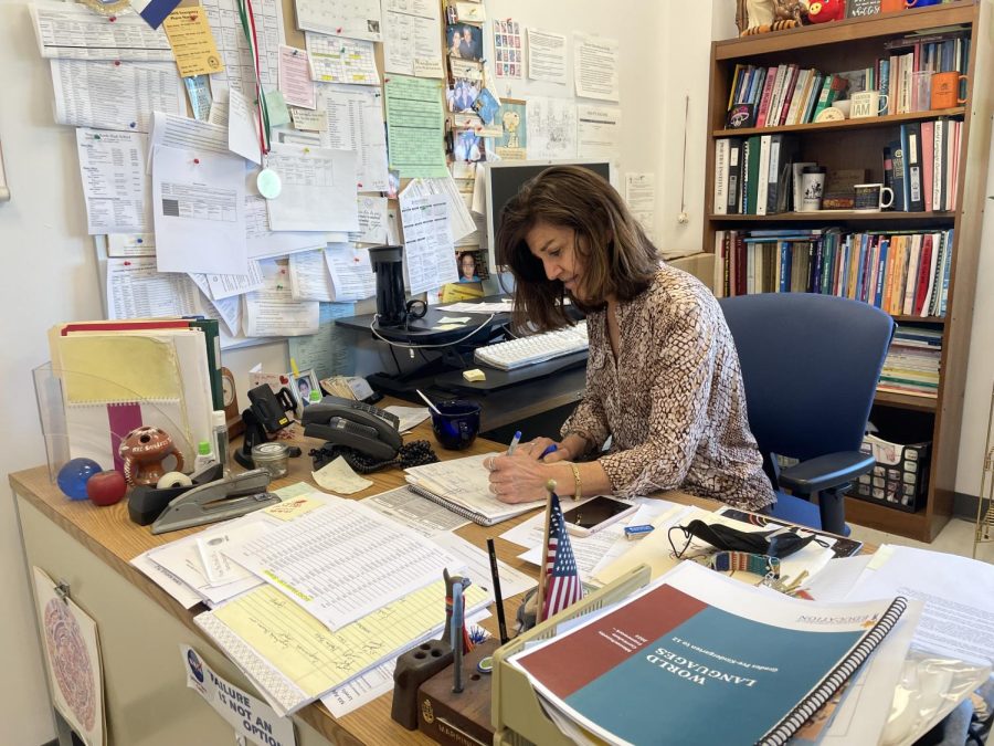 Marinucci works at her desk in her office.