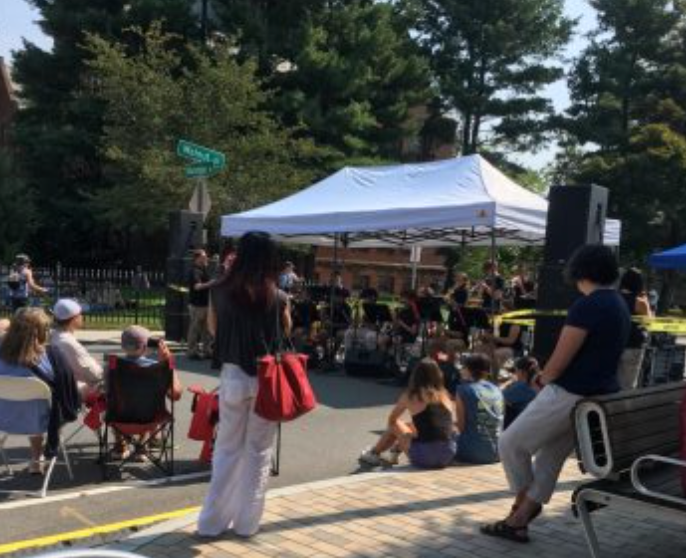 People gather for Newtonville Village Day Sunday, Sept. 18. 