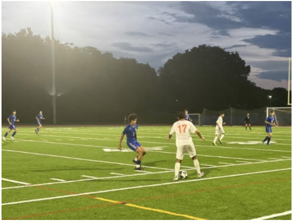 Junior Thiago Rubino takes on his man in game against South Saturday, Sept. 9