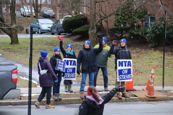 Union members gather outside the Education Center in protest for a fair contract Wednesday, Jan. 31.