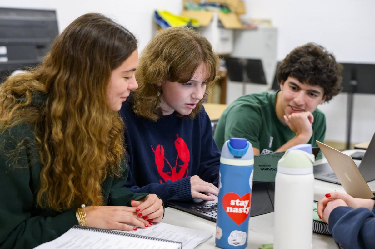 Seniors Nehir Topaloglu, choreographer,  Ellie Marchesseault, stage manger and Arnav Travers, music director, of Heathers plan for auditions, Friday, Sept. 13. 