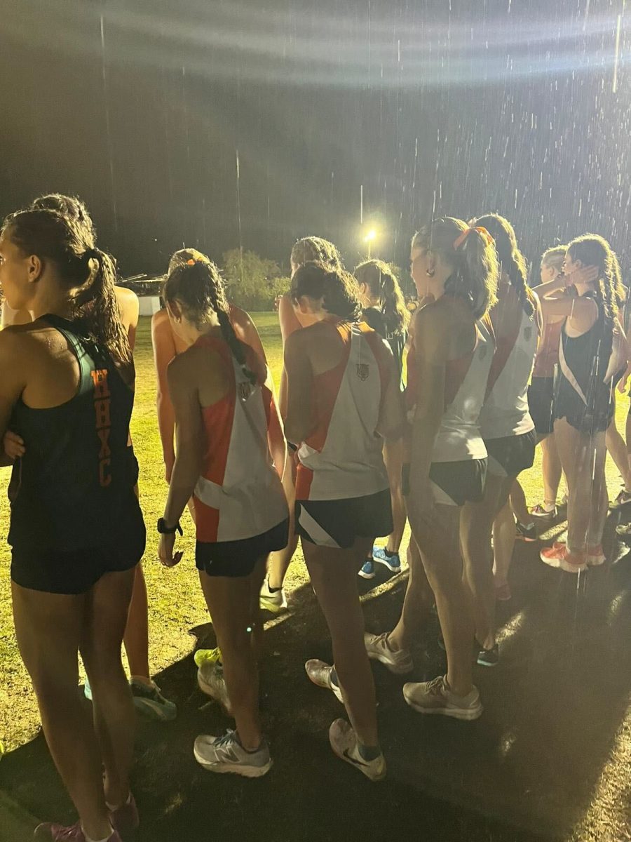 The girls' cross country team stands at the starting line, before the race begins Sunday, Oct. 15.  