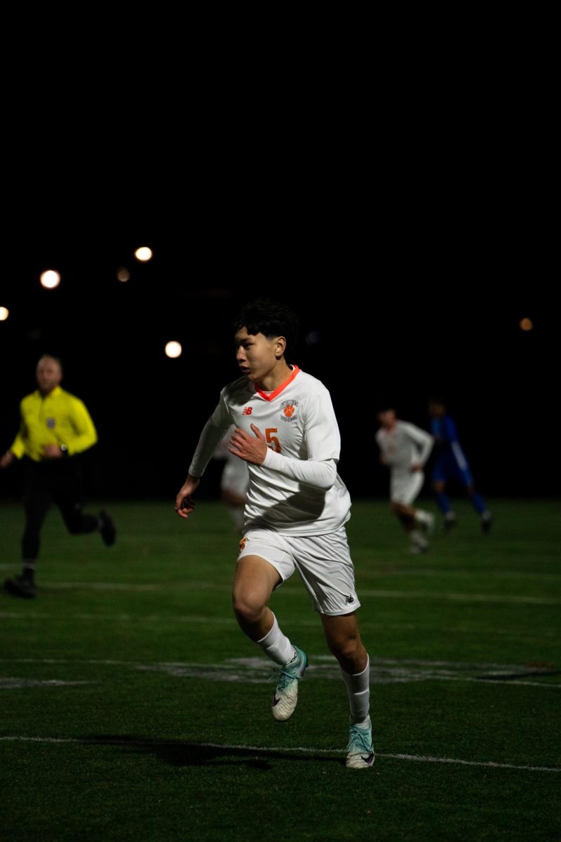 Sophomore Bishrelt "Giga" Bat-Erdene runs to catch up on offense in game against Leominster Saturday, Nov. 9. 