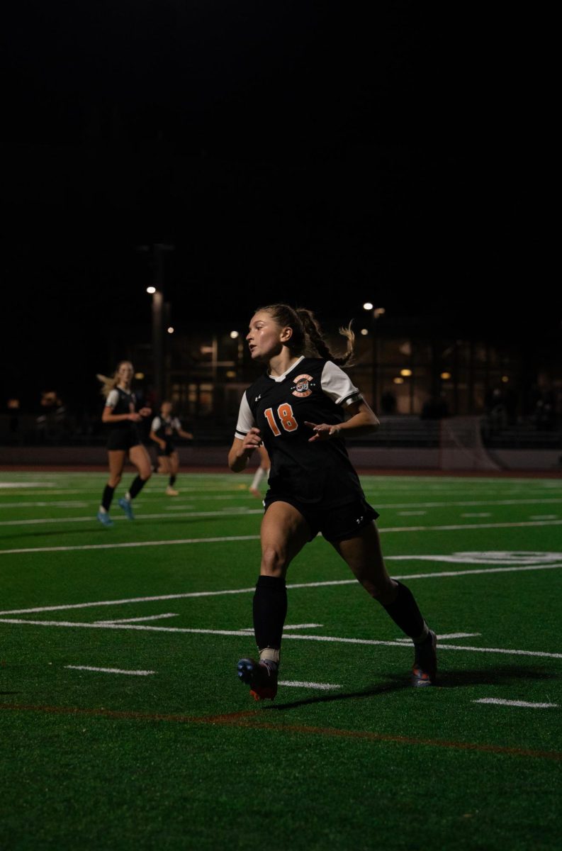 Senior Sophia Mitchell chases after the ball on offense Wednesday, Oct. 23. 