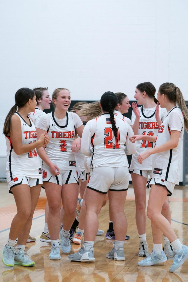 Members of the team celebrate after their victory Friday, Dec. 13. 
