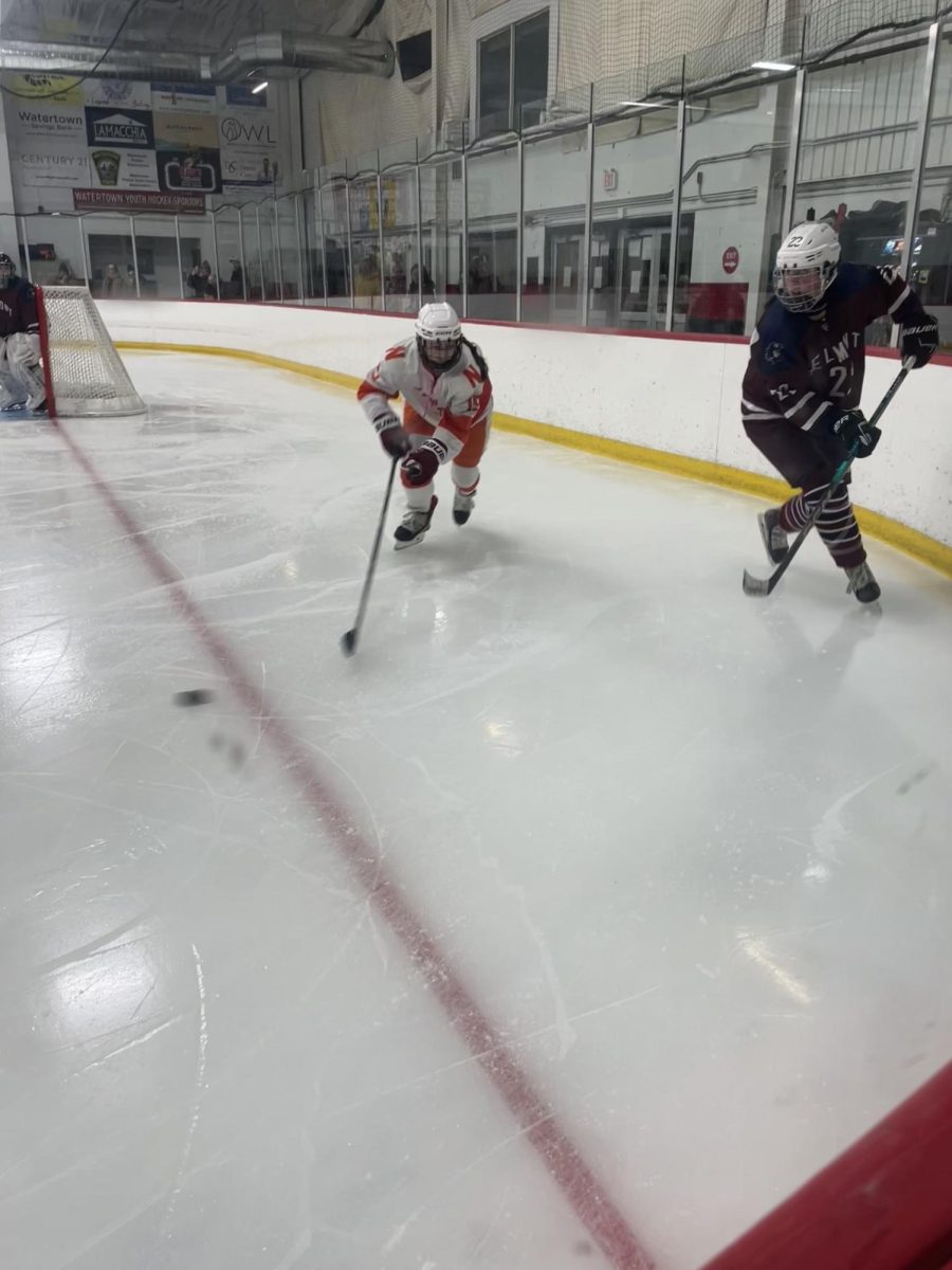 South junior Ollie Rice protects the puck from defenders Monday, Jan. 27. 