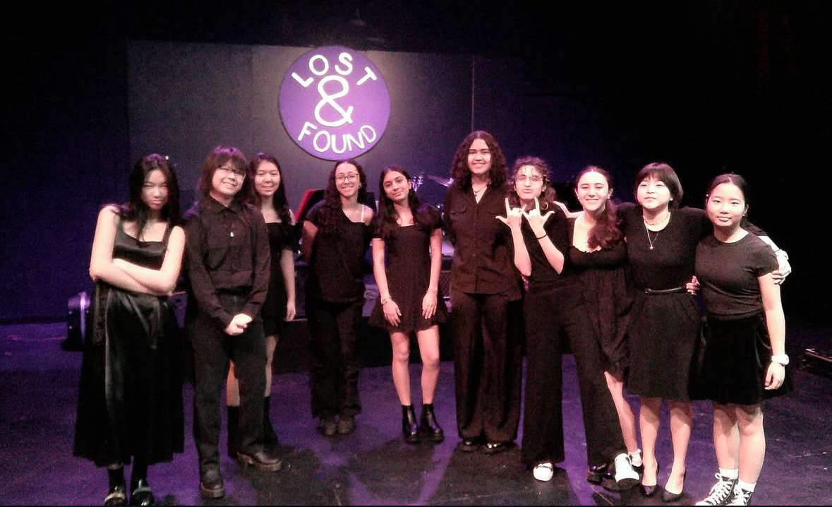 Members of 'Lost and Found' production pose for a group photo during a rehearsal, Saturday, Jan. 12. 