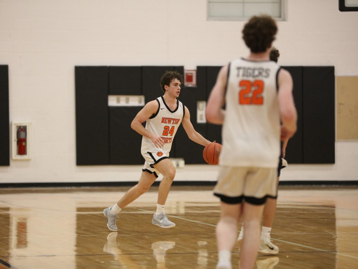 Junior Mathaios Stamm dribbles down the court Tuesday, Jan. 28. 