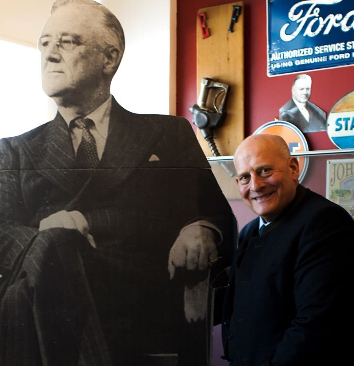 History teacher Brian Goeselt, upon request, sits alongside his cutout of Harry Truman in order to have "two great historians" in the photo Thursday, Feb. 13. 