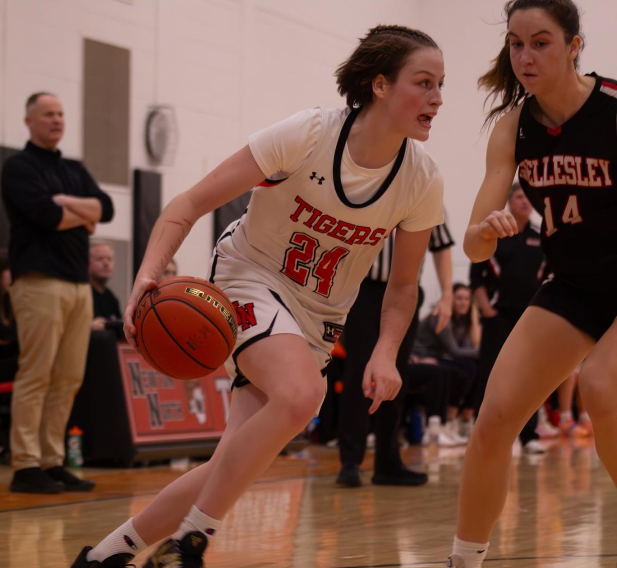 Junior Allie Danis directs the court while dribbling Friday, Jan. 31. 