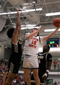 Senior Oliver Wardly goes in for a layup, Thursday, March 13. 