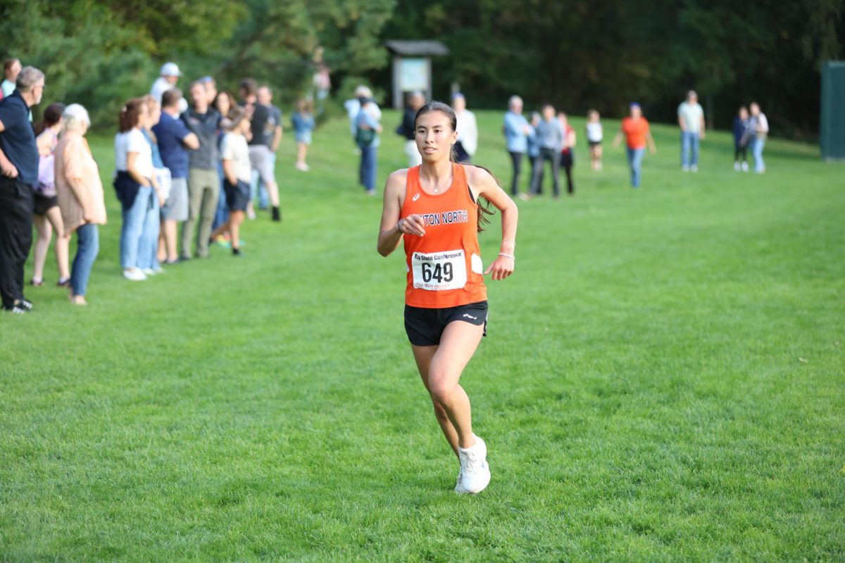 Senior Hava Shenkman races toward the finish line, Wednesday, Sept. 17. 
