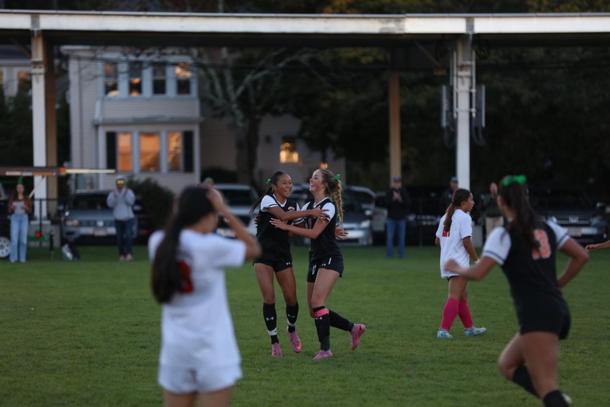 Senior Eva Hautefeuille and junior Alina Yeung celebrate Hautefeuille's first goal of the season, Thursday, Oct. 9. 