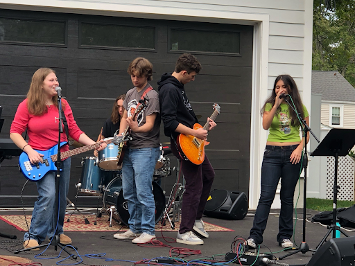 Dad Bod performs live at a block party for neighbors Sunday, Sept. 29, 2024.
