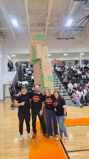 Faculty participates in box-stacking game during pep rally, Tuesday Nov. 25