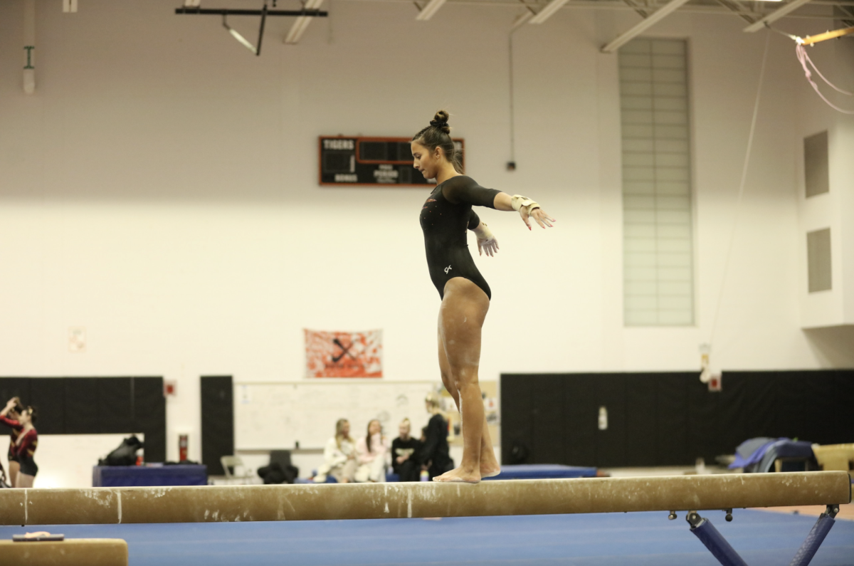 Sophomore Lucia Grapski takes on bars Sunday, Jan. 11. 