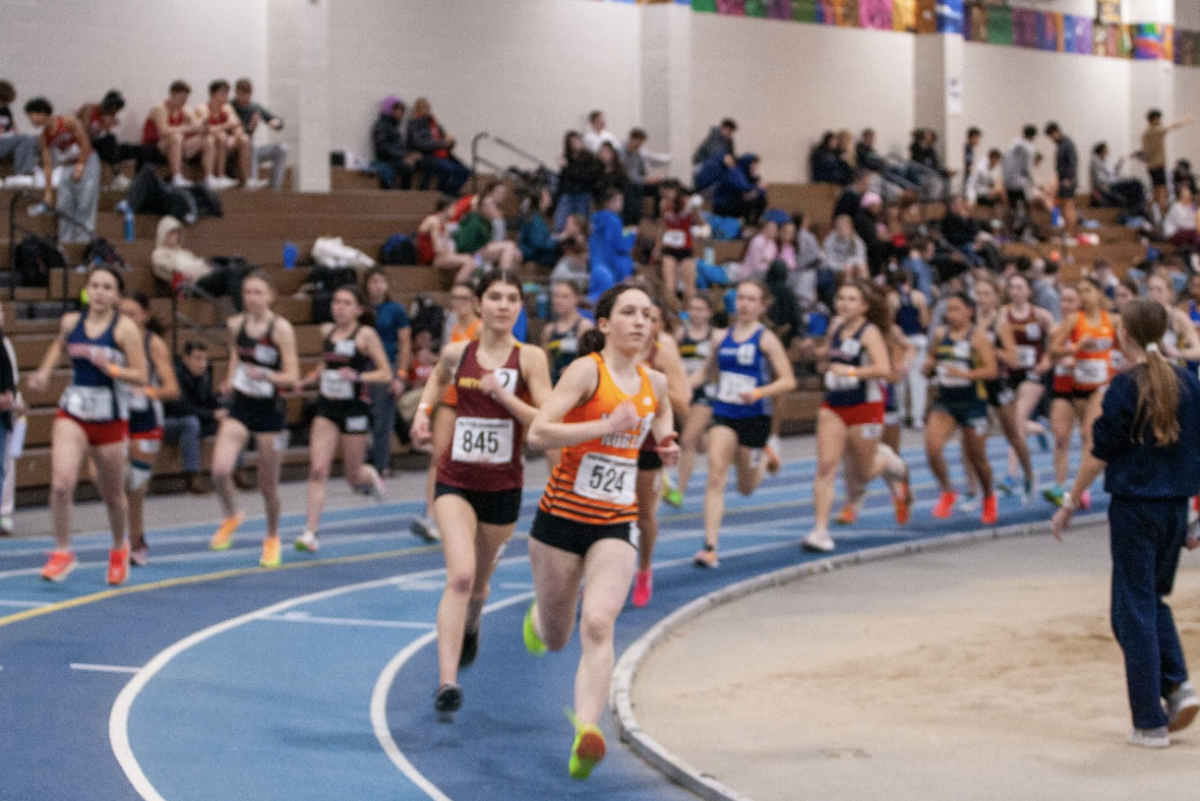 Students participate in a track meet at the Reggie Lewis Track and Athletic Center, Wednesday, Feb. 4.